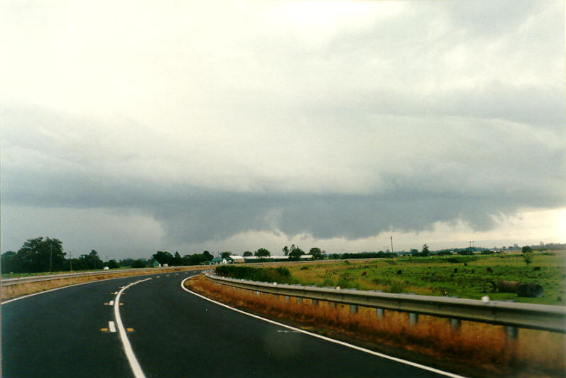 cumulonimbus thunderstorm_base : E of Casino, NSW   23 March 2003